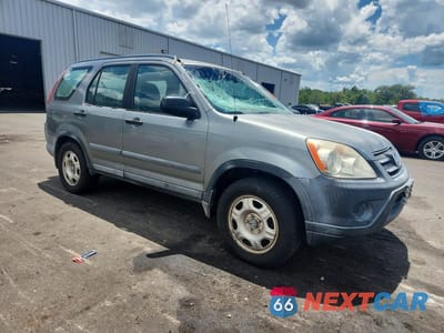 Czwarte zdjęcie samochodu z boku: 2006 HONDA CR-V LX VIN:SHSRD68566U409203 - miniatura