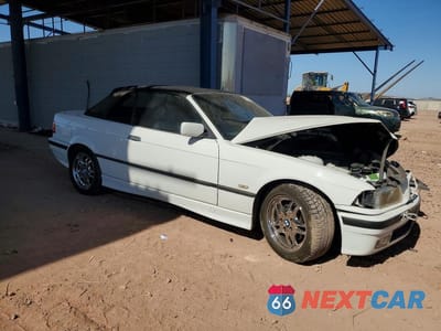 Czwarte zdjęcie samochodu z boku: 1999 BMW 323 IC AUTOMATIC VIN:WBABJ8332XEM24381 - miniatura