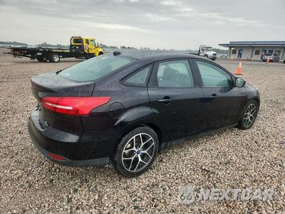 Trzecie zdjęcie samochodu z tyłu: 2018 FORD FOCUS SE VIN:1FADP3FE1JL284956 - miniatura