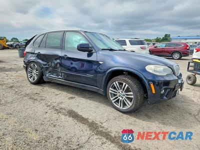 Czwarte zdjęcie samochodu z boku: 2012 BMW X5 XDRIVE50I VIN:5UXZV8C59CL423191 - miniatura