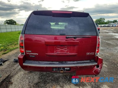 Zdjęcie 6 z 14 samochodu: 2011 GMC YUKON DENALI VIN:1GKS2EEF9BR249865 - miniatura