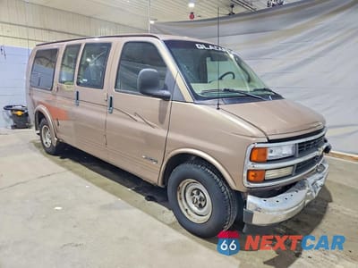 Czwarte zdjęcie samochodu z boku: 2001 CHEVROLET EXPRESS G1500 VIN:1GBFG15W411130422 - miniatura