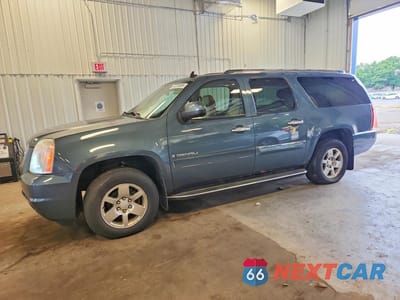 2007 GMC YUKON XL 1GKFK66897J318521 - główne zdjęcie licytacji z USA - miniatura