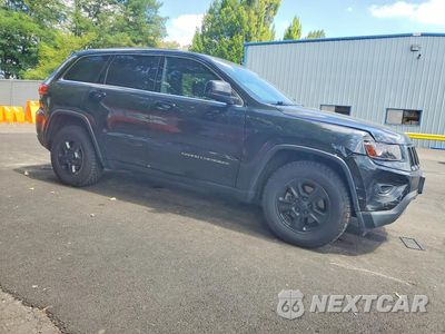 Czwarte zdjęcie samochodu z boku: 2014 JEEP GRAND CHEROKEE LAREDO VIN:1C4RJFAG0EC294976 - miniatura