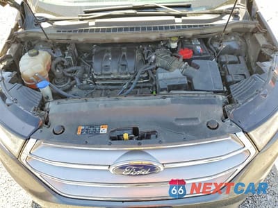 Zdjęcie 12 z 13 samochodu: 2015 FORD EDGE SEL VIN:2FMPK4J85FBC26977 - miniatura