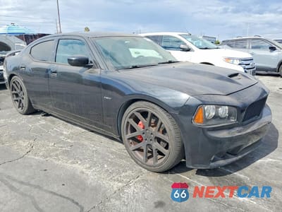 Czwarte zdjęcie samochodu z boku: 2006 DODGE CHARGER SRT-8 VIN:2B3LA73W76H335409 - miniatura