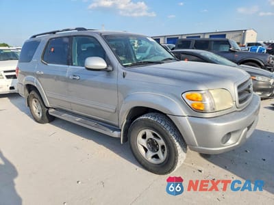 Czwarte zdjęcie samochodu z boku: 2002 TOYOTA SEQUOIA SR5 VIN:5TDZT34A72S137133 - miniatura