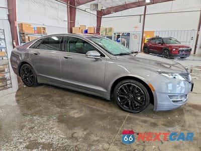 Czwarte zdjęcie samochodu z boku: 2014 LINCOLN MKZ HYBRID VIN:3LN6L2LU2ER829666 - miniatura