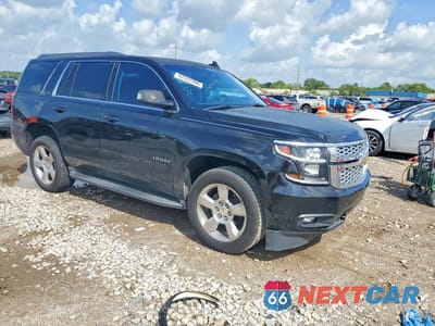Czwarte zdjęcie samochodu z boku: 2015 CHEVROLET TAHOE C1500 LT VIN:1GNSCBKC5FR727472 - miniatura