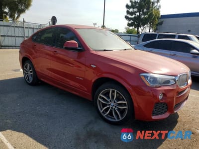 Czwarte zdjęcie samochodu z boku: 2015 BMW X4 XDRIVE28I VIN:5UXXW3C56F0F88650 - miniatura