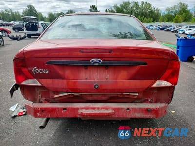 Zdjęcie 6 z 12 samochodu: 2003 FORD FOCUS LX VIN:1FAFP33Z83W302984 - miniatura