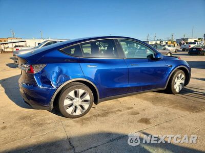 Trzecie zdjęcie samochodu z tyłu: 2023 TESLA MODEL Y VIN:7SAYGDEE0PA086481 - miniatura