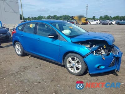 Czwarte zdjęcie samochodu z boku: 2013 FORD FOCUS SE VIN:1FADP3K23DL371967 - miniatura
