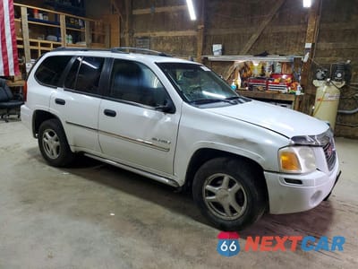 Czwarte zdjęcie samochodu z boku: 2006 GMC ENVOY VIN:1GKDT13S162115865 - miniatura