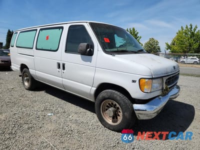 Czwarte zdjęcie samochodu z boku: 2000 FORD ECONOLINE E350 SUPER DUTY WAGON VIN:1FBSS31L5YHB48210 - miniatura