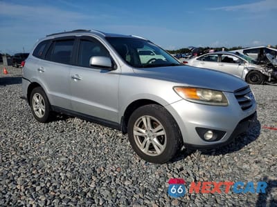 Czwarte zdjęcie samochodu z boku: 2012 HYUNDAI SANTA FE LIMITED VIN:5XYZKDAG0CG094772 - miniatura