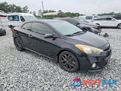 Czwarte zdjęcie samochodu z boku: 2016 KIA FORTE KOUP SX VIN:KNAFZ6A31G5601360 - miniatura