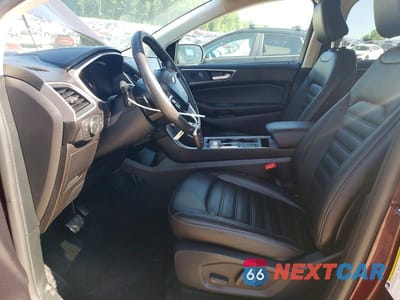 Zdjęcie 7 z 12 samochodu: 2021 FORD EDGE SEL VIN:2FMPK4J93MBA35581 - miniatura