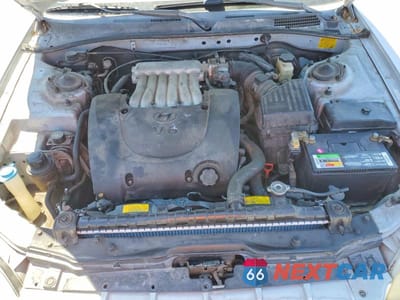 Zdjęcie 11 z 12 samochodu: 2000 HYUNDAI SONATA GLS VIN:KMHWF35V1YA276140 - miniatura