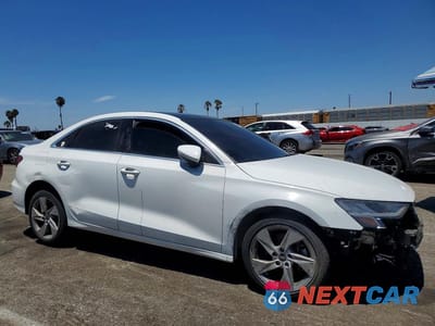 Czwarte zdjęcie samochodu z boku: 2022 AUDI A3 PREMIUM VIN:WAUAUDGY2NA077091 - miniatura