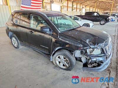 Czwarte zdjęcie samochodu z boku: 2014 JEEP COMPASS VIN:1C4NJCBA0ED573832 - miniatura
