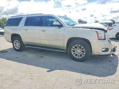 Czwarte zdjęcie samochodu z boku: 2017 GMC YUKON XL K1500 SLT VIN:1GKS2GKC9HR182375 - miniatura