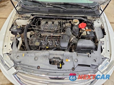 Zdjęcie 11 z 12 samochodu: 2015 FORD TAURUS SEL VIN:1FAHP2H83FG129067 - miniatura