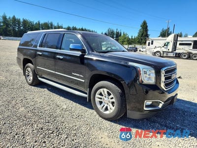 Czwarte zdjęcie samochodu z boku: 2015 GMC YUKON XL K1500 SLE VIN:1GKS2GKC6FR502393 - miniatura