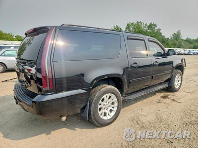 Trzecie zdjęcie samochodu z tyłu: 2010 CHEVROLET SUBURBAN K1500 LS VIN:1GNUKHE39AR169550 - miniatura