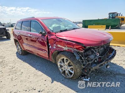 Czwarte zdjęcie samochodu z boku: 2014 JEEP GRAND CHEROKEE SUMMIT VIN:1C4RJFJTXEC423058 - miniatura