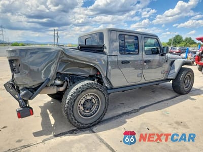 Trzecie zdjęcie samochodu z tyłu: 2022 JEEP GLADIATOR RUBICON VIN:1C6JJTBM4NL136275 - miniatura