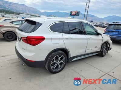 Trzecie zdjęcie samochodu z tyłu: 2018 BMW X1 XDRIVE28I VIN:WBXHT3C30J3H31809 - miniatura