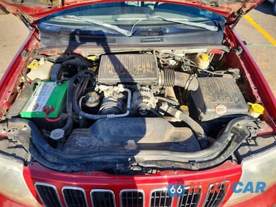 Zdjęcie 11 z 12 samochodu: 2002 JEEP GRAND CHEROKEE LIMITED VIN:1J8GW58NX2C257879 - miniatura
