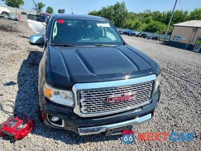 Piąte zdjęcie samochodu w środku: 2017 GMC CANYON DENALI VIN:1GTG6EEN2H1291086 - miniatura