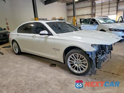 Czwarte zdjęcie samochodu z boku: 2014 BMW 750 LI VIN:WBAYE8C56ED780500 - miniatura