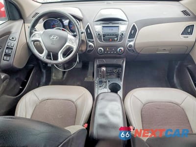 Zdjęcie 8 z 13 samochodu: 2010 HYUNDAI TUCSON GLS VIN:KM8JUCAC6AU021685 - miniatura