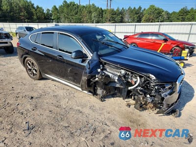 Czwarte zdjęcie samochodu z boku: 2024 BMW X4 XDRIVE30I VIN:5UX33DT08R9X09659 - miniatura