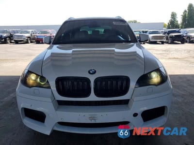 Piąte zdjęcie samochodu w środku: 2011 BMW X5 M VIN:5YMGY0C51BLK26927 - miniatura