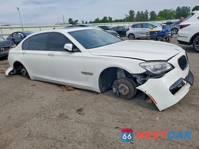 Czwarte zdjęcie samochodu z boku: 2013 BMW 750 LXI VIN:WBAYF8C5XDD139930 - miniatura
