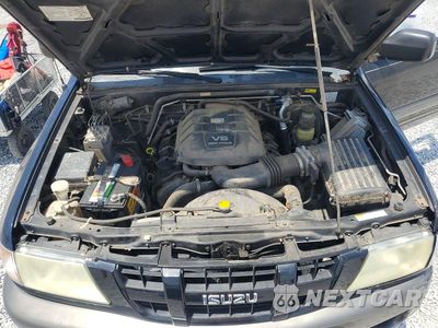 Zdjęcie 12 z 13 samochodu: 2003 ISUZU RODEO S VIN:4S2CK58W834313957 - miniatura