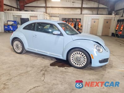 Czwarte zdjęcie samochodu z boku: 2014 VOLKSWAGEN BEETLE VIN:3VWJP7AT3EM629853 - miniatura