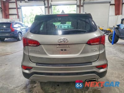 Zdjęcie 6 z 12 samochodu: 2017 HYUNDAI SANTA FE SPORT 2.4L VIN:5XYZUDLB8HG445608 - miniatura