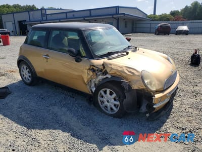 Czwarte zdjęcie samochodu z boku: 2004 MINI COOPER VIN:WMWRC334X4TJ53338 - miniatura