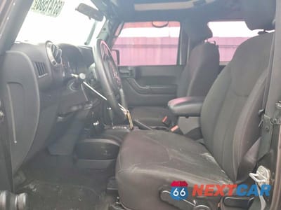 Zdjęcie 7 z 12 samochodu: 2017 JEEP WRANGLER SPORT VIN:1C4AJWAG2HL553274 - miniatura