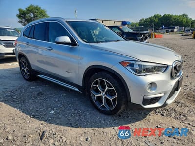 Czwarte zdjęcie samochodu z boku: 2017 BMW X1 XDRIVE28I VIN:WBXHT3Z39H4A53797 - miniatura