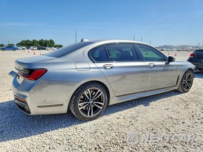 Trzecie zdjęcie samochodu z tyłu: 2021 BMW 750 XI VIN:WBA7U2C03MCF05240 - miniatura