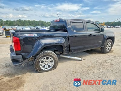 Trzecie zdjęcie samochodu z tyłu: 2021 CHEVROLET COLORADO LT VIN:1GCGTCENXM1125602 - miniatura