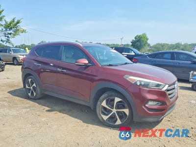 Czwarte zdjęcie samochodu z boku: 2016 HYUNDAI TUCSON LIMITED VIN:KM8J3CA28GU231031 - miniatura
