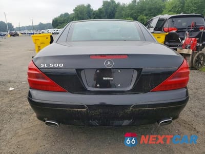 Zdjęcie 6 z 13 samochodu: 2004 MERCEDES-BENZ SL 500 VIN:WDBSK75FX4F066940 - miniatura
