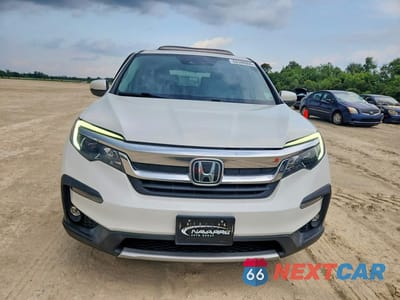 Piąte zdjęcie samochodu w środku: 2021 HONDA PILOT EXL VIN:5FNYF5H57MB015701 - miniatura